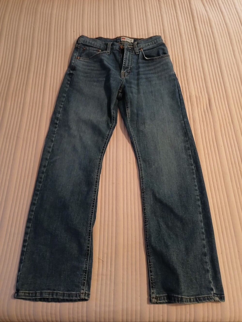 Wrangler Relaxed Boot Cut Jeans in Medium Blue